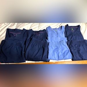 Four pairs of Purple Label Healing Hand scrubs size large